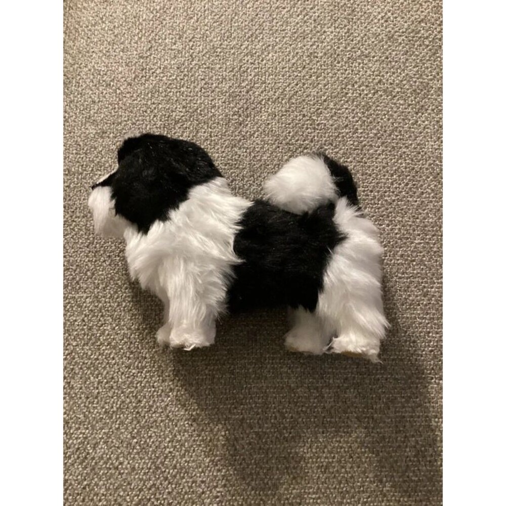 Lifelike fuzzy dog